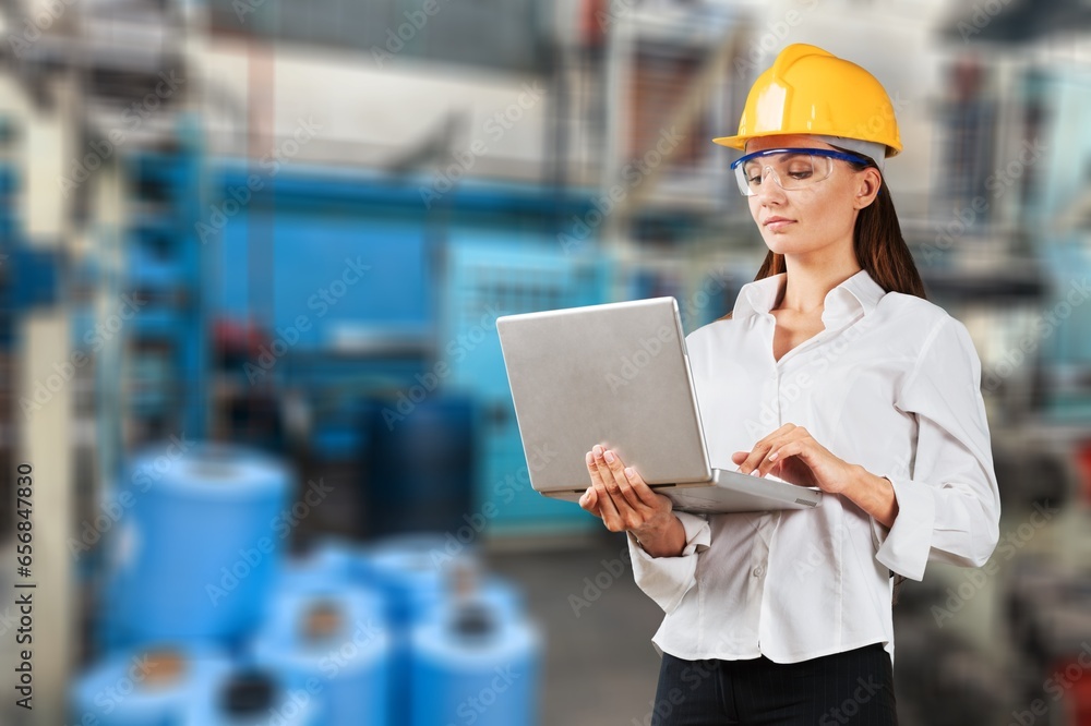 Young engineer manager woman at manufacturing factory Young engineer manager woman at manufacturing factory