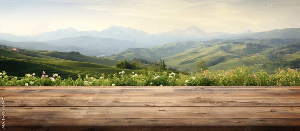 Tuscan landscape in background on wooden desk