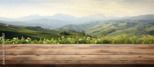 Tuscan landscape in background on wooden desk