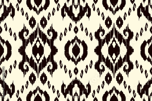 Ikat paisley embroidery on the fabric in Indonesia,India and asian countries.geometric ethnic oriental seamless pattern.Aztec style. illustration.design for texture,fabric,clothing,wrapping,carpet.