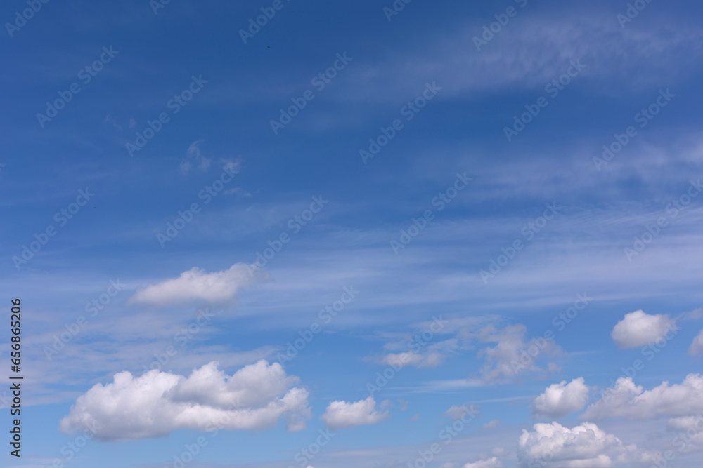 Stratocumulus Clouds on Blue Sky Background. Stratocumulus Clouds on Blue Sky Background.