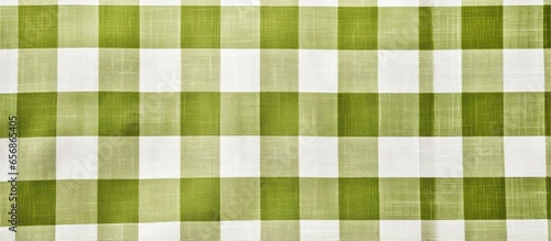 Checkerboard pattern tablecloth and olive textile napkin background Plaid fabric macro