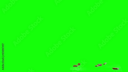 Bulk of bricks thrown from top side of the screen and scattering on imaginary flat surface, green screen background, animation overlay video for chroma key blending option. Bricks thrown away. photo