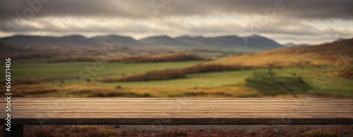 Empty, wooden table in a beautiful Scottish Highlands landscape with flat, empty Rocksurface for product presentation. Generative AI. photo