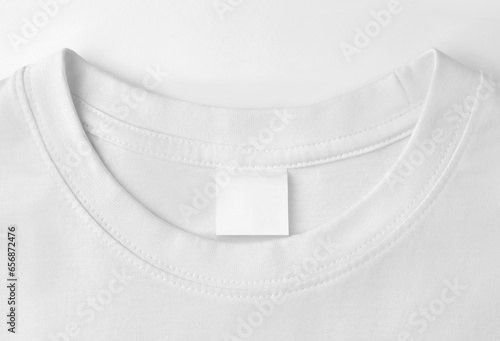 blank clothing label on white t shirt photo