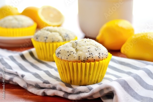 lemon poppy seed muffin on a bright yellow napkin