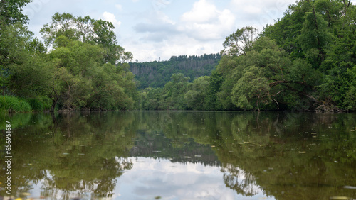 Fototapeta Naklejka Na Ścianę i Meble -  A River landscape - The river Eder in a green landscape