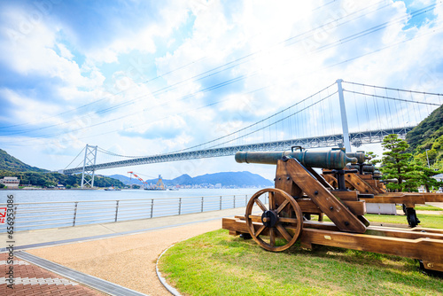 初秋の長州砲と関門橋　山口県下関市　Choshu Gun and Kanmon Bridge in early autumn. Yamaguchi Pref, Shimonoseki City. photo