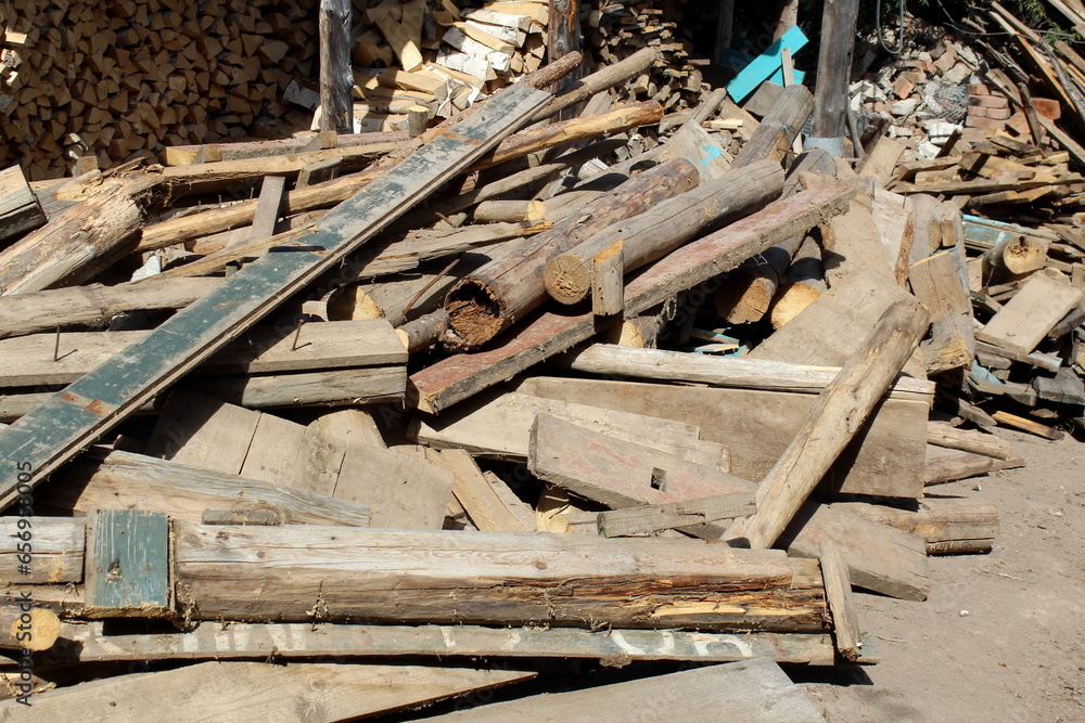 A bunch of old logs lie like trash. A bunch of old logs lie like trash.