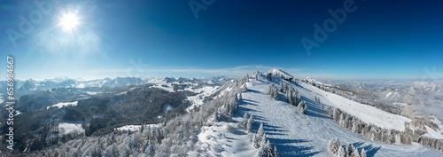 Austria, Salzburger Land, Saint Gilgen, Drone panorama of snowcapped Zwolferhorn mountain and surrounding landscape