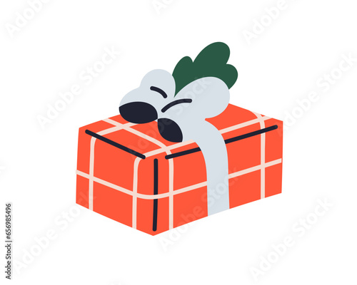 Christmas gift box wrapped in checkered paper wrapping. Xmas present in festi...