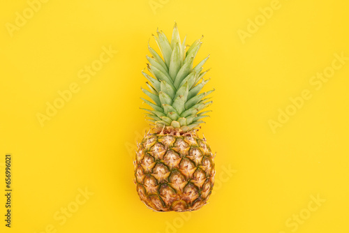 ripe pineapple isolated on white background. Bright pineapple in minimal style. Fresh pineapples on blue background. Tropical fruits. Vegetarianism. Summer fruits.