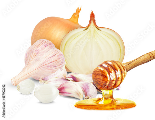 garlic, onion and honey dripping from dipper isolated on white