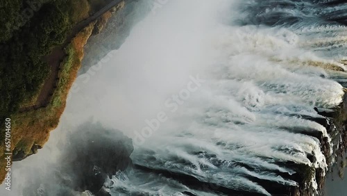 Vertical Aerial View Victoria Falls, Shungu Namutitima at the Border of Zimbabwe and Zambia in Africa. The Great Victoria Falls One of the Most Beautiful Wonders of the World 4K UHD Aerial Dron Shot photo