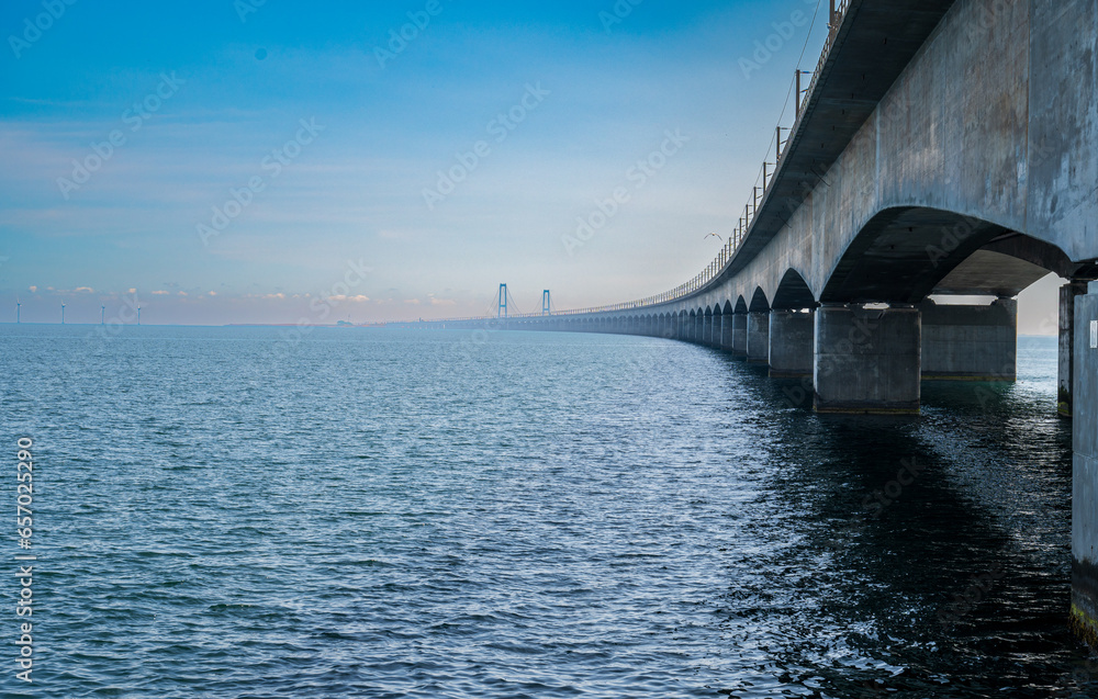 Big concrete bridge over the blue sea