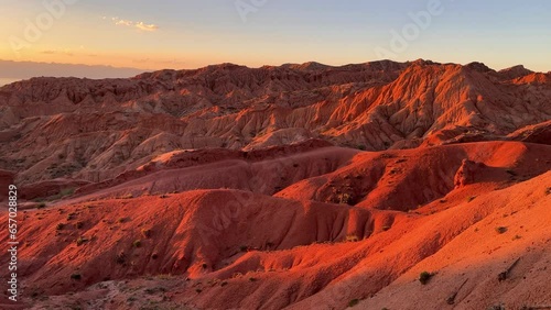 A fabulous canyon in Central Asia. Scenic view of a beautiful textured multi-layered canyon. Mountain ranges in a fabulous canyon at sunset near Lake Issyk-Kul in Karakol. 4K