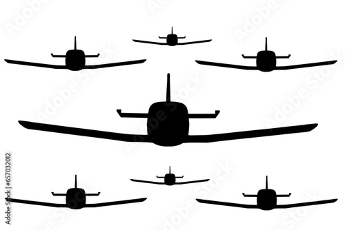 Kamikaze plane jet fighter in formation vector silhouette illustration isolated. Squadron aircraft in battle attack position. Swarm of attacking drones. Robot remote control drone on sky.