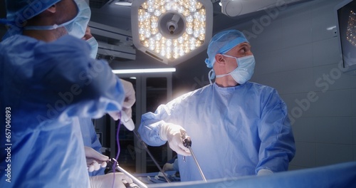 Canvas Print Adult man lies on table under anesthesia
