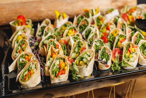 Set of vegetable roll snacks at the wedding event.
