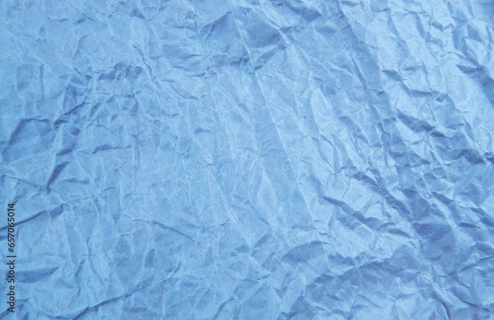 Obraz premium Blue crumpled paper texture pattern. Rough grunge old blank.
