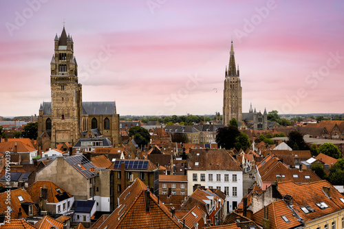 BRUGES, BELGIUM amazing historic city that enchants tourists visitors with its picturesque canals historic medieval architecture towers and medieval charmand tour The Bruges horsecar  © fabrizio