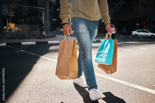 Foto Man, legs and shopping bags in street of city, pedestrian or crosswalk for travel, shop or mall