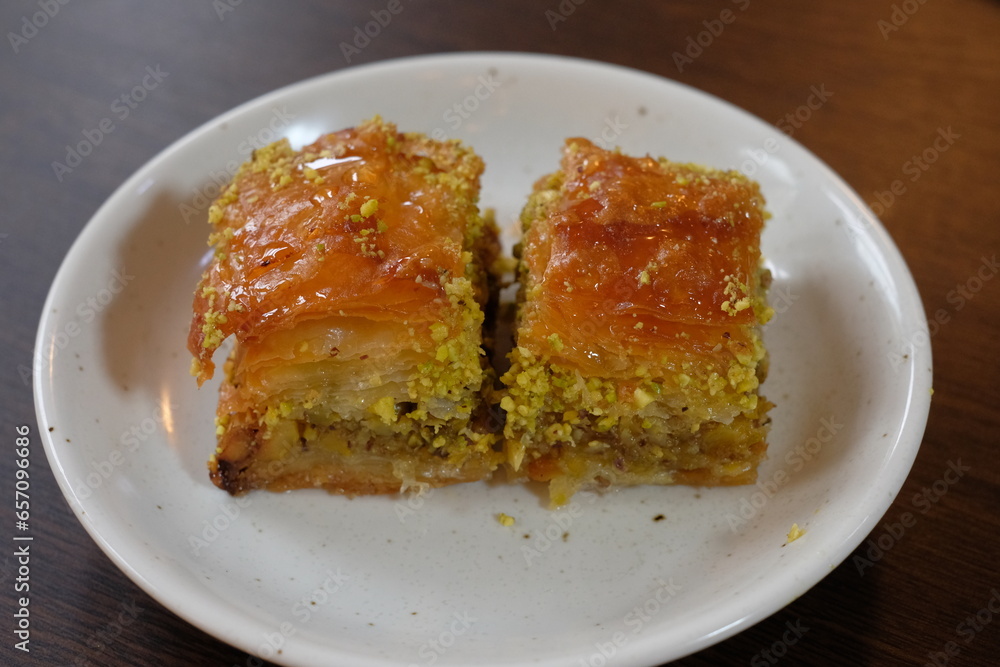 baklava, rich Middle Eastern cake made of thin layers of flaky pastry filled with nuts and honey baklava, rich Middle Eastern cake made of thin layers of flaky pastry filled with nuts and honey