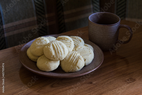 Homemade corn flour gluten-free cookies on ceramic plate, selective focus