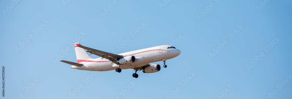 Naklejka premium white airplane is flying