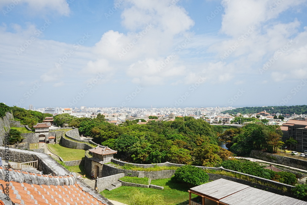 Aerial view of Naha city and sea shore from Shurijo castle in Okinawa, japan. Panorama - 沖縄 那覇市の街並みと海
