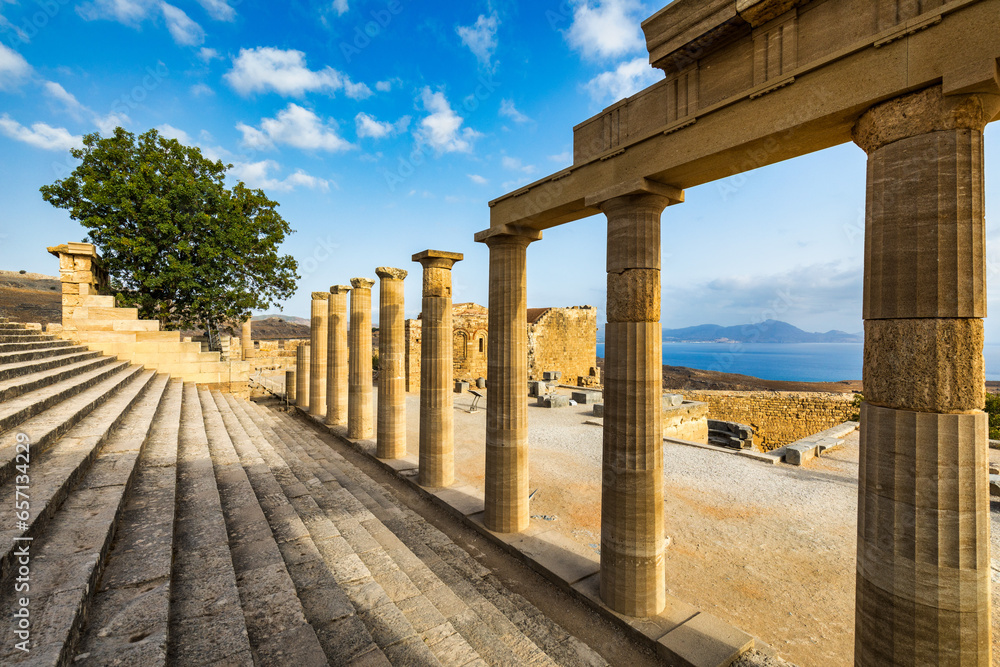 Ruins of Acropolis of Lindos view, Rhodes, Dodecanese Islands, Greek Islands, Greece. Acropolis of Lindos, ancient architecture of Rhodes, Greece.