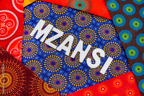 Mzansi, a slang word for South Africa, in white letters with iconic South African Shwe Shwe fabric photo