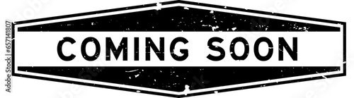 Grunge black coming soon word hexagon rubber seal stamp on white background