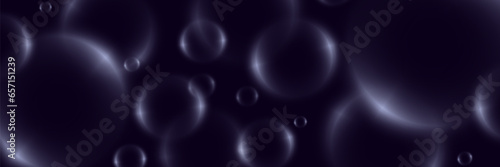 Abstract background with neon bubbles, iridescent colorful glass balls or spheres on a black background.