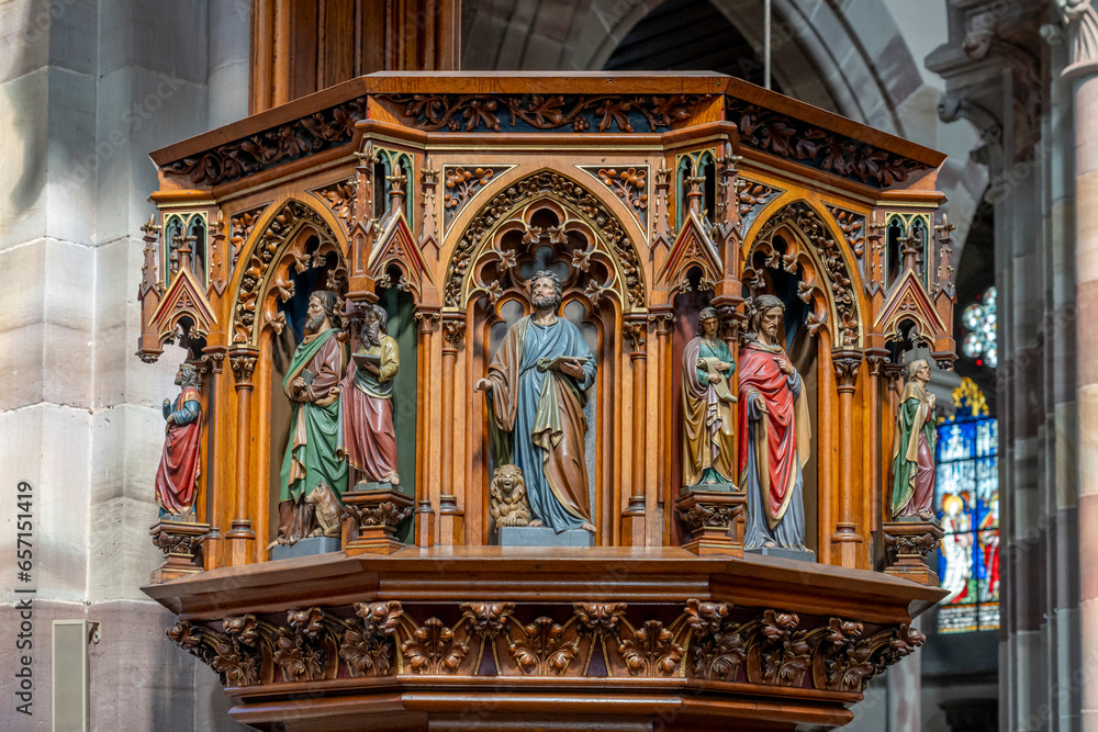 Obraz premium Obernai, France - 09 07 2023: View of a detail inside the Saints Peter and Paul Church.