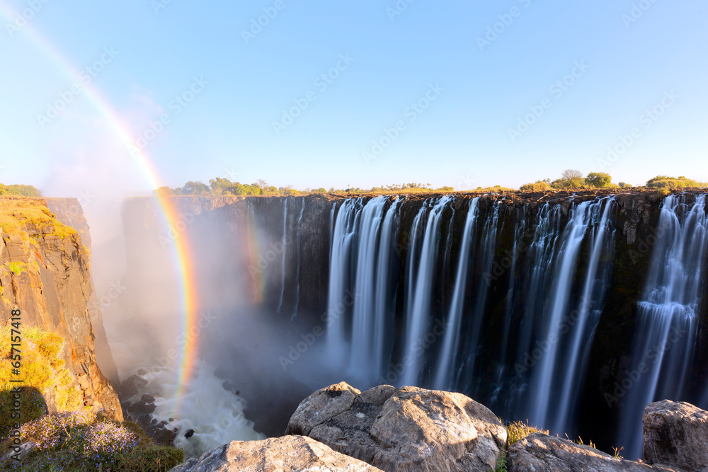 Victoria falls - The biggest waterfall in Africa, bordering Zambia and Zimbabwe - obrazy, fototapety, plakaty 