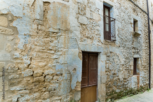 Old facade with door and windows at Sos del Rey Catolico. Zaragoza. Aragon. Spain. Europe.