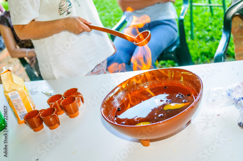 Image of typical queimada, or burned wine, from Galicia, Spain,during a traditional celebration photo
