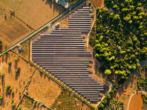 Aerial view from drone of photovoltaic solar panels farm, Malorca, Spain