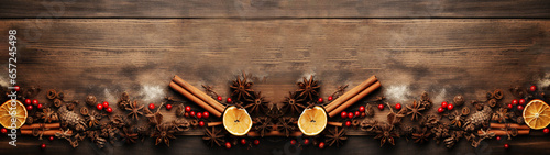 Christmas, christmas items background, zitrone, cinnamon sticks, twigs on wooden texture or table, banner, lifestyle photo