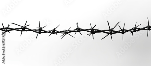 Black and white vertical barbed wires With copyspace for text photo