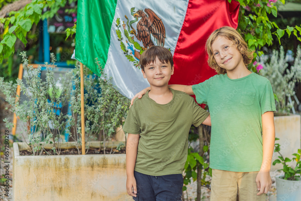 Immigrant boys in Mexico in front of the Mexican flag. New Mexicans Immigrant boys in Mexico in front of the Mexican flag. New Mexicans