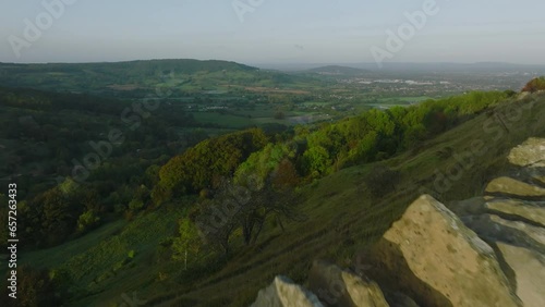 Cinematic reveal of beautiful british countryside over drystone wall