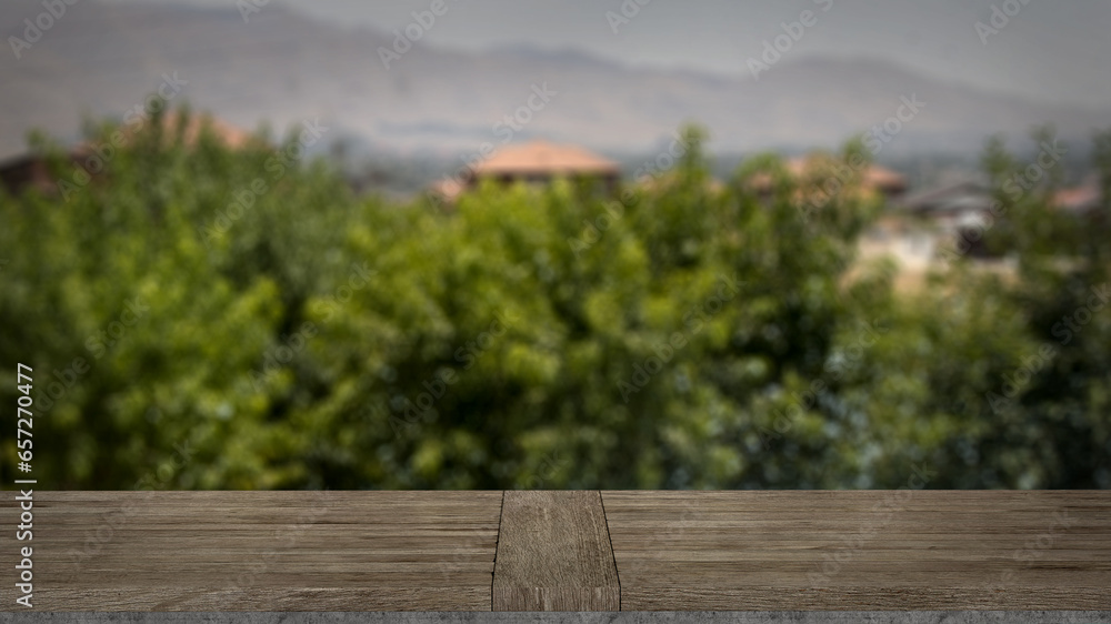 Blank wooden table with blurred background. Good for product arrangement