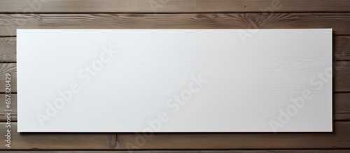White trifold paper template on wooden texture With copyspace for text