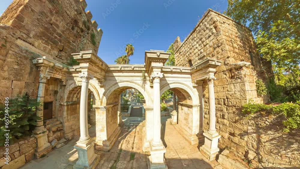 The ancient archway Hadrian's Gate in Antalya of Turkey, marvel of Roman architecture. dating to 2nd century AD. Welcomes visitors with its grandeur offering a glimpse into city's rich historical past