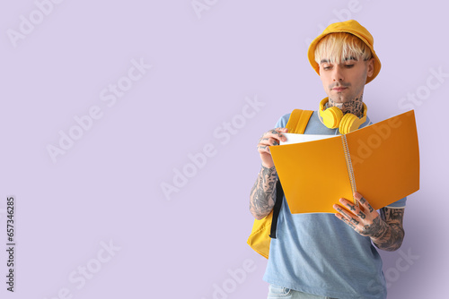 Tattooed male student with ...