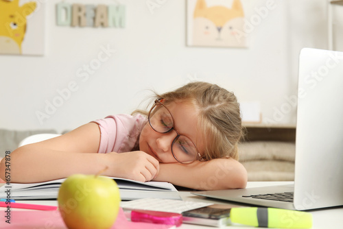 Tired little girl sleeping ...
