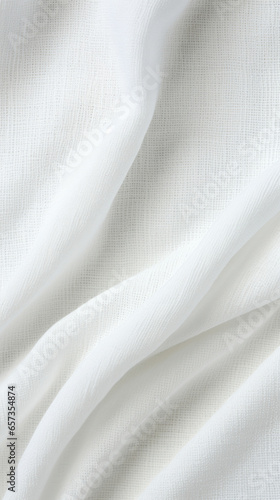 Closeup of a woven cotton gauze texture, characterized by its lightweight and breathable nature, perfect for airy summer garments.