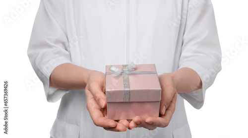 Doctor holding gift box on white background, closeup. Medical present